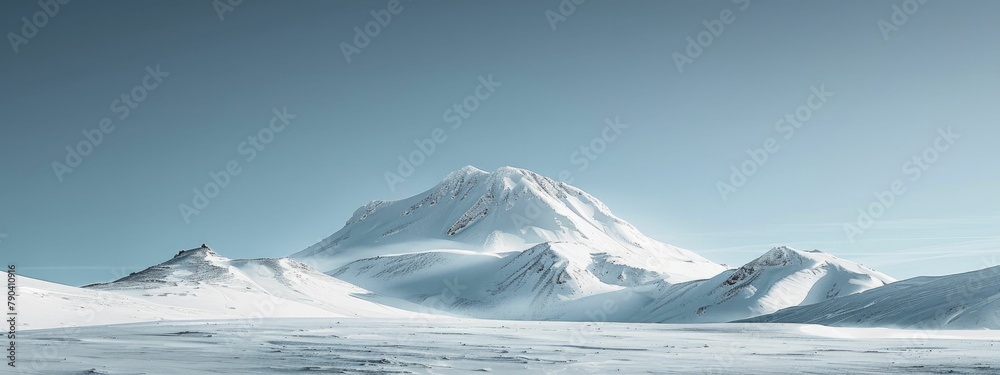 Beholding the serene minimalist snowy peak under the vast expanse of clear blue skies evokes a sense of tranquility and awe.