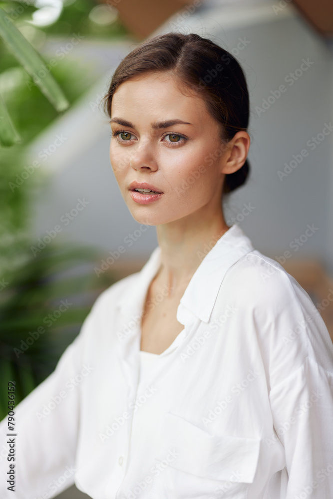 Happy Woman Enjoying Tropical Vacation on a Sunlit Balcony Terrace Relaxation and Trendy Lifestyle This vibrant image captures a young woman standing on a sunny balcony, surrounded by lush green Happy Woman Enjoying Tropical Vacation on a Sunlit Balcony Terrace Relaxation and Trendy Lifestyle This vibrant image captures a young woman standing on a sunny balcony, surrounded by lush green