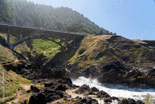 bridge over a rocky sea inlet