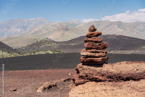 stacked rock cairn along a volcanic trail