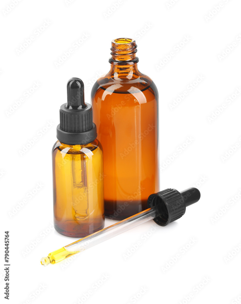 Glass bottles and pipette with tincture isolated on white