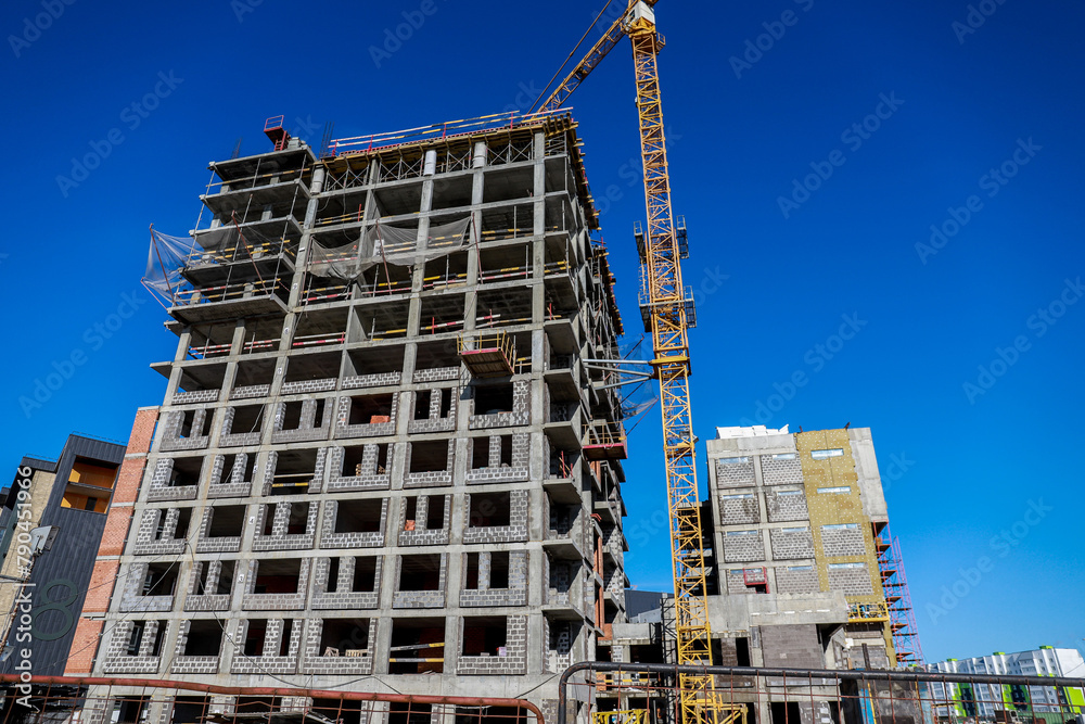 Fototapeta premium Crane operating on a construction site