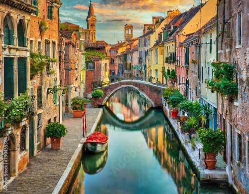 Top view, A network of narrow canals winding through a historic city, lined with colorful buildings and crossed by arched stone bridges. photo