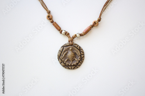 Brazilian handmade necklace sea turtle pendant carved on wood. Indigenous, ethnic, tribal fashion collar for women.