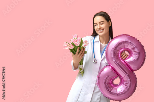 Female doctor with tulips a...