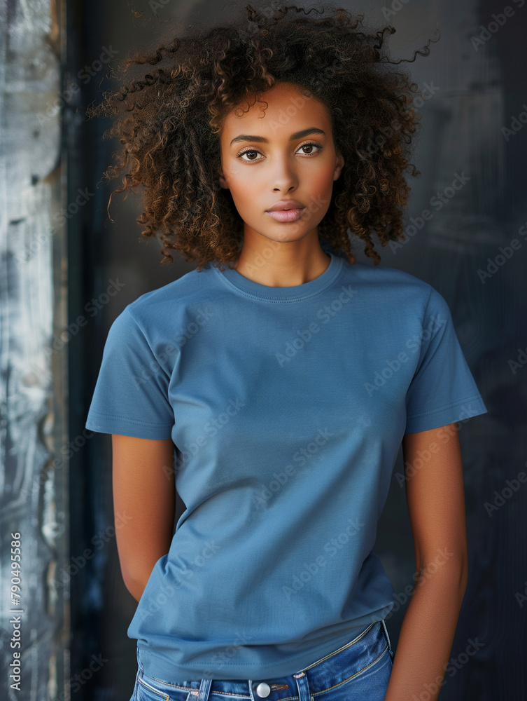 A woman wearing a blank blue t-shirt mock-up, mock up for t-shirt design A woman wearing a blank blue t-shirt mock-up, mock up for t-shirt design