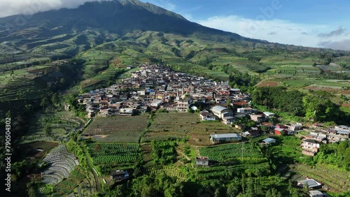 Aerial View of Kruwisan Village in the Mountains. Kruwisan Village is a mountain village in Sumbing located in Temanggung district, Central Java, Indonesia. photo