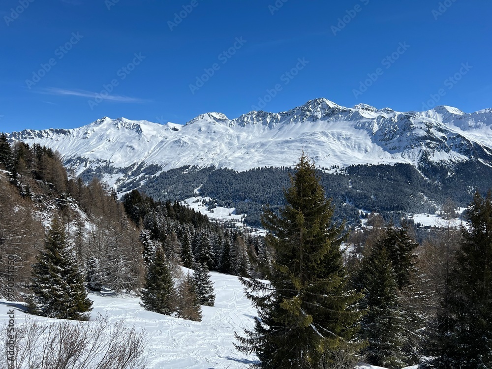 A fairytale winter atmosphere and a magnificent panorama on the mountine tourist resorts of Valbella and Lenzerheide in the Swiss Alps - Canton of Grisons, Switzerland (Kanton Graubünden, Schweiz)