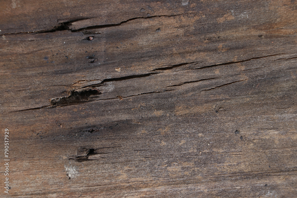 Naklejka premium Old wooden texture for background that has natural cracks.