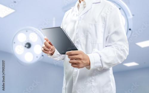 Doctor wear white lab coat hand hold digital tablet