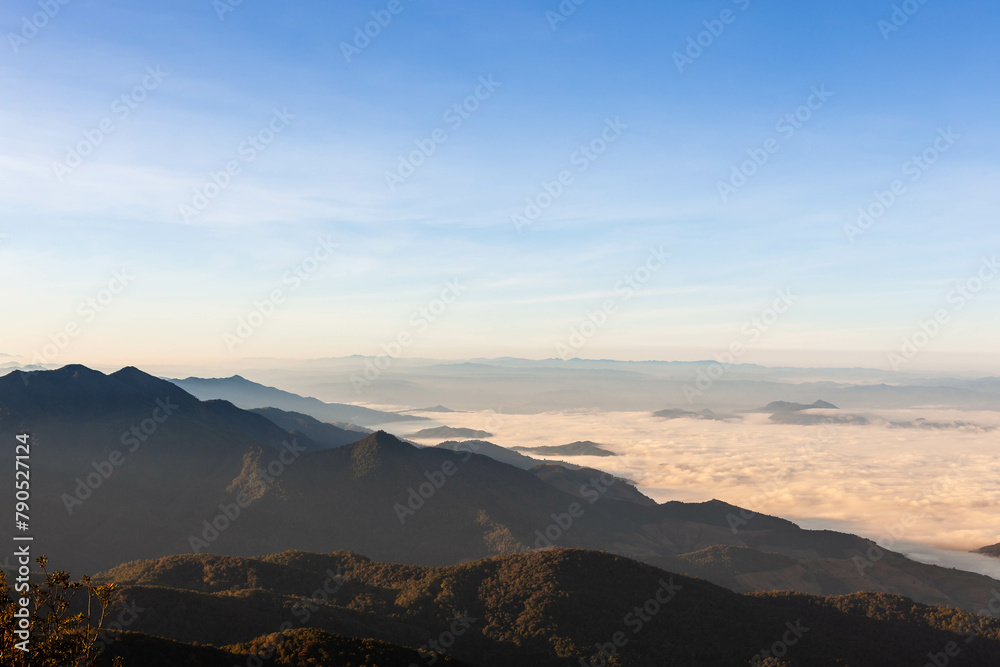 Doi Inthanon National Park. Sea of mist and clouds view from the highest mount in Thailand on clear day. Beautiful Thai Landscape.