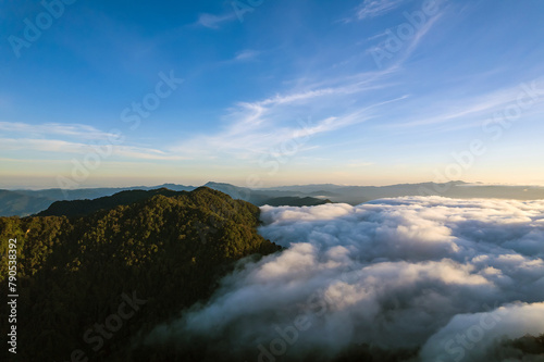 Beautiful sunlight over the mountain and misty of Thailand