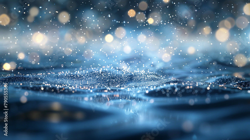A dynamic ultramarine and silver abstract vista, where bokeh lights appear as if stars are falling into the deep blue sea. The effect is mesmerizing and dreamlike. photo