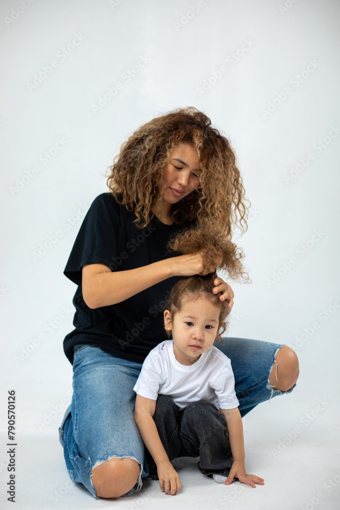 Happy loving family. Mother and her daughter child girl playing and hugging. Happy loving family. Mother and her daughter child girl playing and hugging.