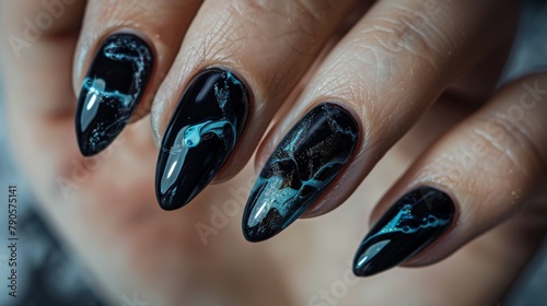 Hand with Black and Blue Manicure