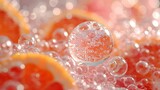   A tight shot of oranges with water bubbles atop and beneath