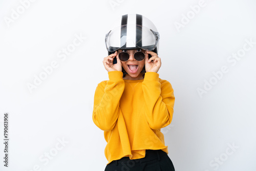 Woman with a motorcycle helmet with glasses and surprised