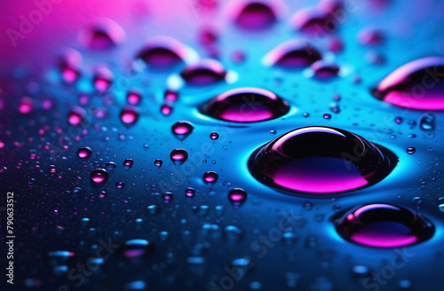 Abstract background - drops of multicolored drops on a dark surface. Concept drinks photo