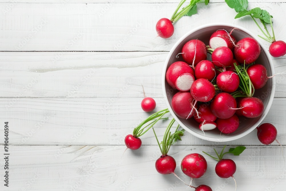 Freshly picked radishes in a ceramic bowl on a rustic white table Freshly picked radishes in a ceramic bowl on a rustic white table