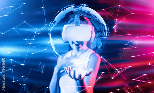 Female stand surrounded by neon light wear white VR headset and tank top connecting metaverse, future cyberspace community technology, She holding and watch 3D global picture hologram. Hallucination.