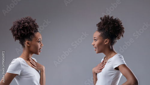 Both women astonished by their mirrored similarities: me too! photo