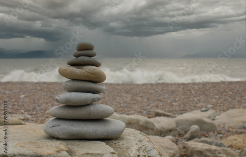 Pyramid of stones in the sand at the beach and waves  © Stockwerk-Fotodesign