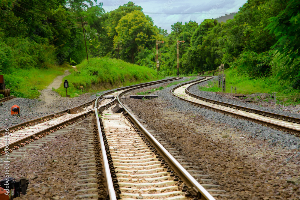 Railway tracks amidst the mountains at Khun Tan Station