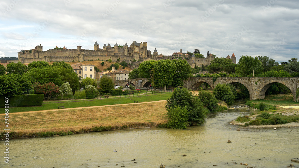 Medieval bridge Pont Vieux with Carcassone castle panoramic view, popular tourist landmark in France