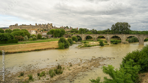 Medieval bridge Pont Vieux with Carcassone castle panoramic view, popular tourist landmark in France