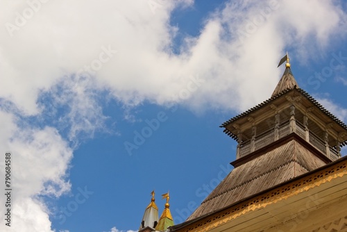 The top and roof of the watchtower in Rostov the Great against the sky. photo