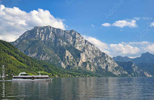 Ferry boat sails on Lake Traun Traunsee in Upper Austria photo