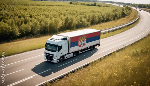 An Serbia-flagged truck hauls cargo along the highway, embodying the essence of logistics and transportation in the Serbia