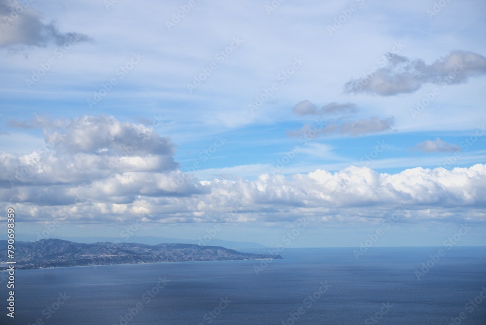 Horizon sea and cloudy sky overlooking the Sicilian island