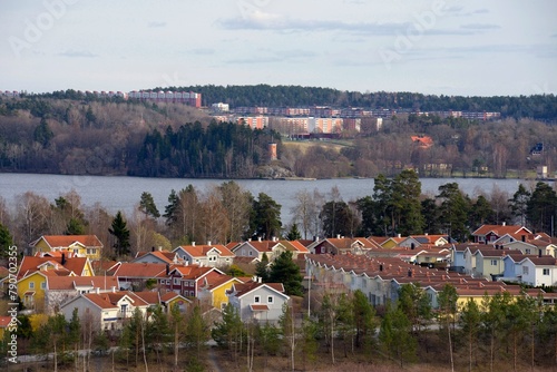 Homes with Pond. Scene of prime real estate community in Stockholm area. Living in serenity