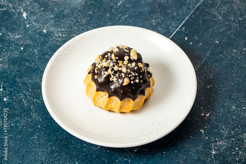 Chocolate Puff Pastry served in plate isolated on background side view of cafe baked food