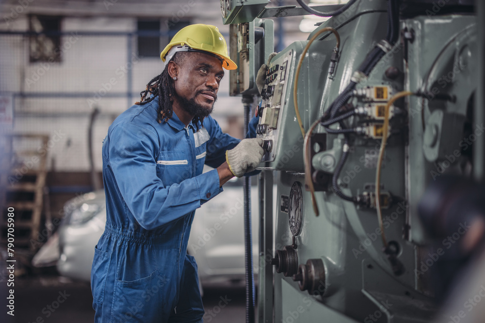 Technician adjusts and troubleshoots factory machinery for optimal performance and safety standard Technician adjusts and troubleshoots factory machinery for optimal performance and safety standard