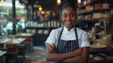Happy smiling Afro of African American chef woman standing in a kitchen restaurant. AI generated