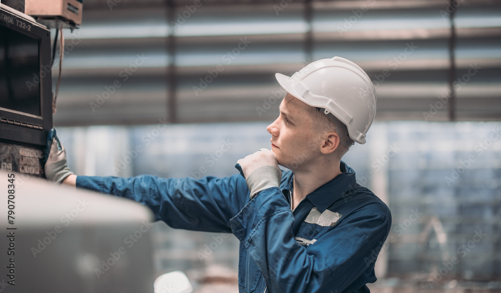Technician adjusts and troubleshoots factory machinery for optimal performance and safety standard Technician adjusts and troubleshoots factory machinery for optimal performance and safety standard