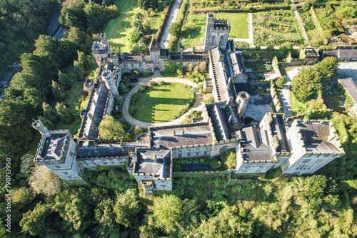 Behold Lismore Castle in County Waterford, Ireland, as if viewed through the eyes of an eagle, capturing every intricate detail of its historic grandeur from above