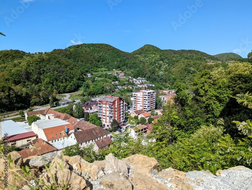 Beautiful cityscape scenery of buildings and architecture in old town surrounded by forest and hills at Krapina, Croatia, County Hrvatsko zagorje photo