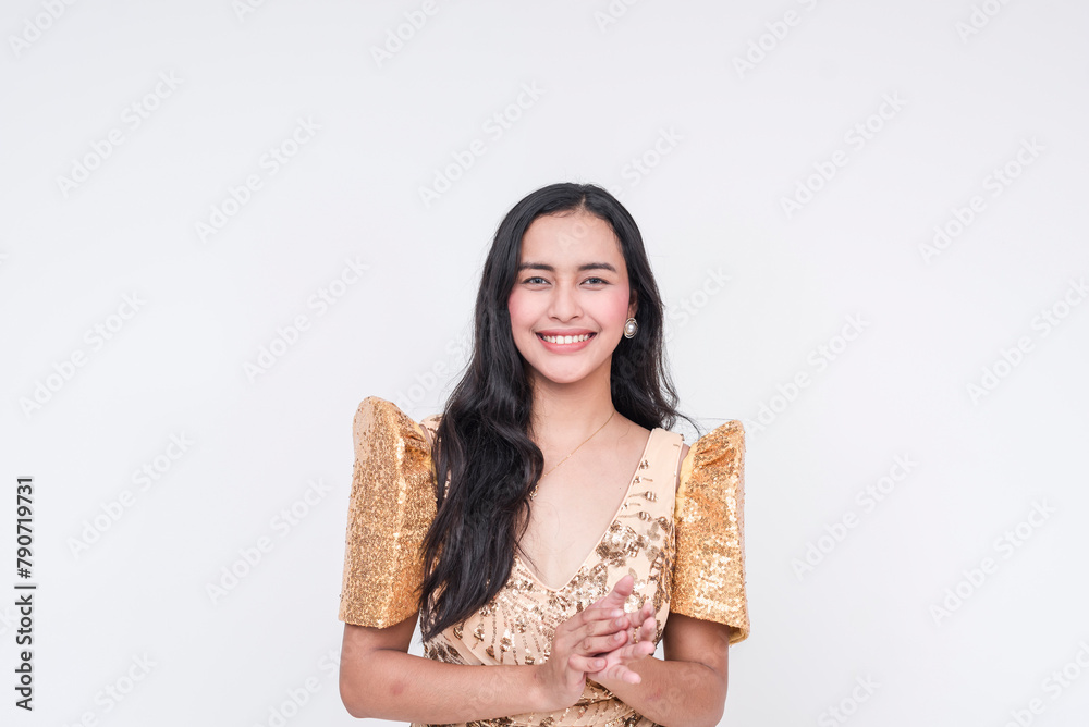 Beautiful Filipino woman in traditional Filipiniana dress proposing, isolated on white