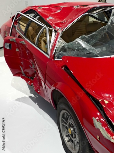 Red car after a road accident