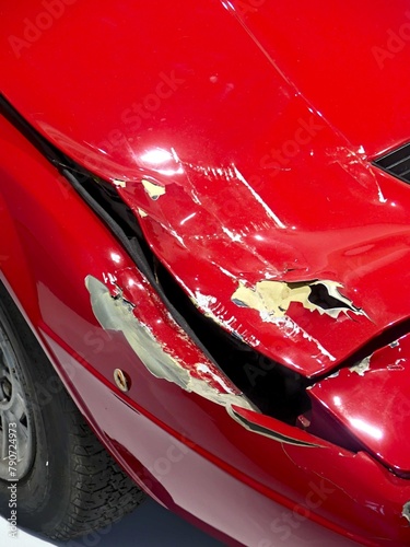 Red car after a road accident