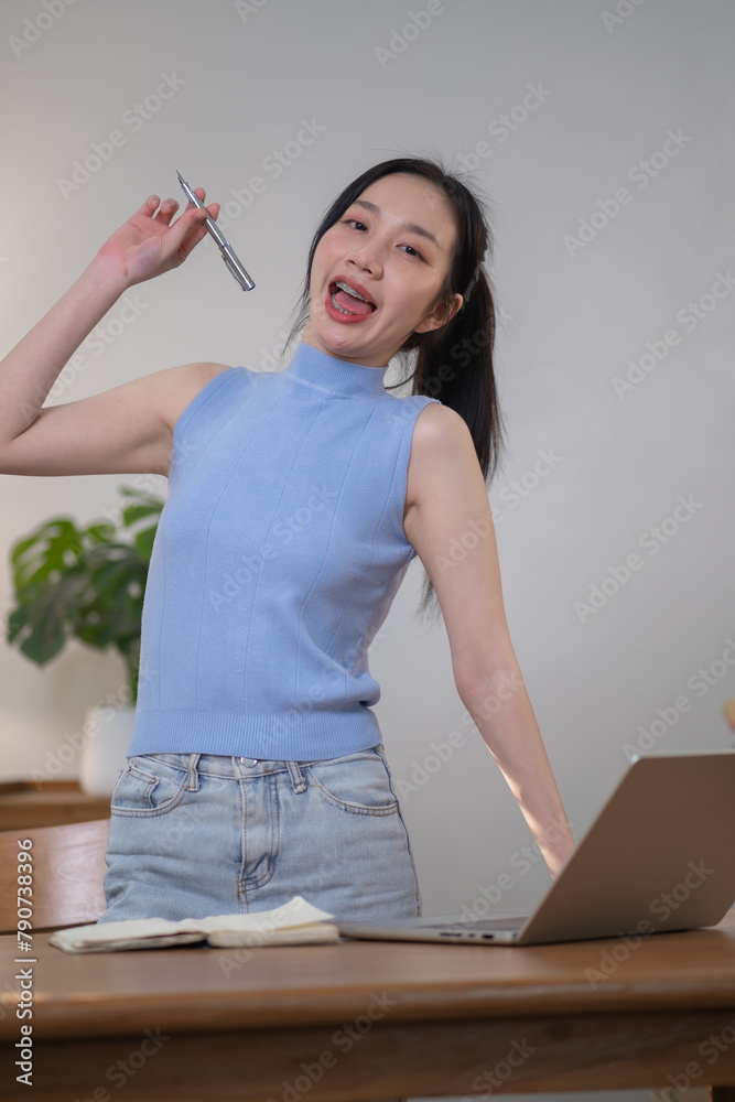 Happy Asian woman education learning by technology e-learning by computer, Learning online on internet Happy Asian woman education learning by technology e-learning by computer, Learning online on internet