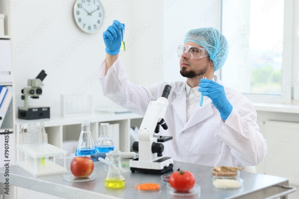 Quality control. Food inspector checking safety of products in laboratory Quality control. Food inspector checking safety of products in laboratory