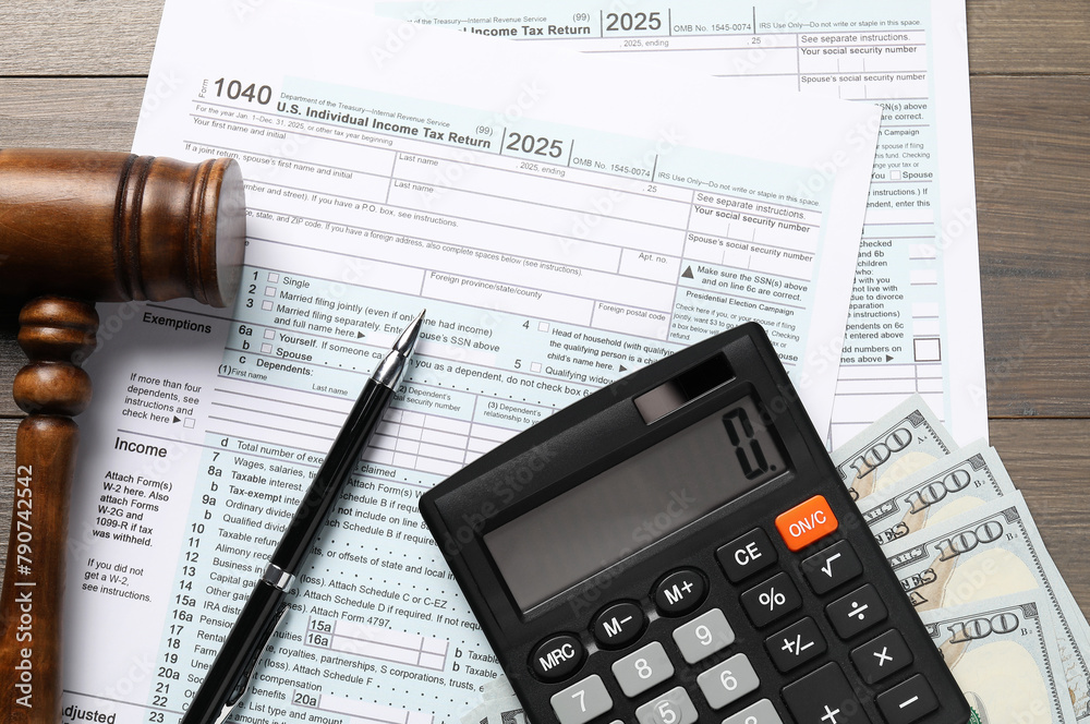 Tax law. Flat lay composition with gavel and forms on wooden table