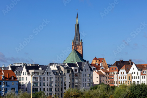 View of townhouses on Piastowski Boulevard, in the background a tower of Szczecin Cathedral, Szczecin, Poland