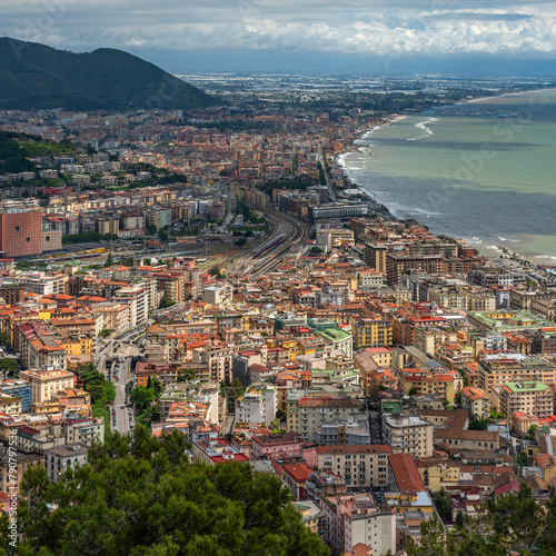 Densely populated areas of the Italian city of Salerno. Salerno is a city and port on the Tyrrhenian Sea in southern Italy, the administrative center of the Salerno province of the Campania region. photo