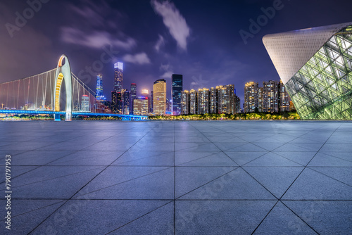 City square floors with modern buildings at night in Guangzhou © ABCDstock