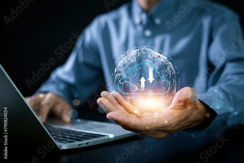 Businessman showing virtual glowing cloud computing Big data and analytics visualization technology with Database storage cloud technology file data transfer sharing, cyber, information . © A Stockphoto